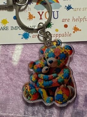 Rainbow colored Puzzle Piece Cuddling Teddy Bears Bagcharm with affirmation card
